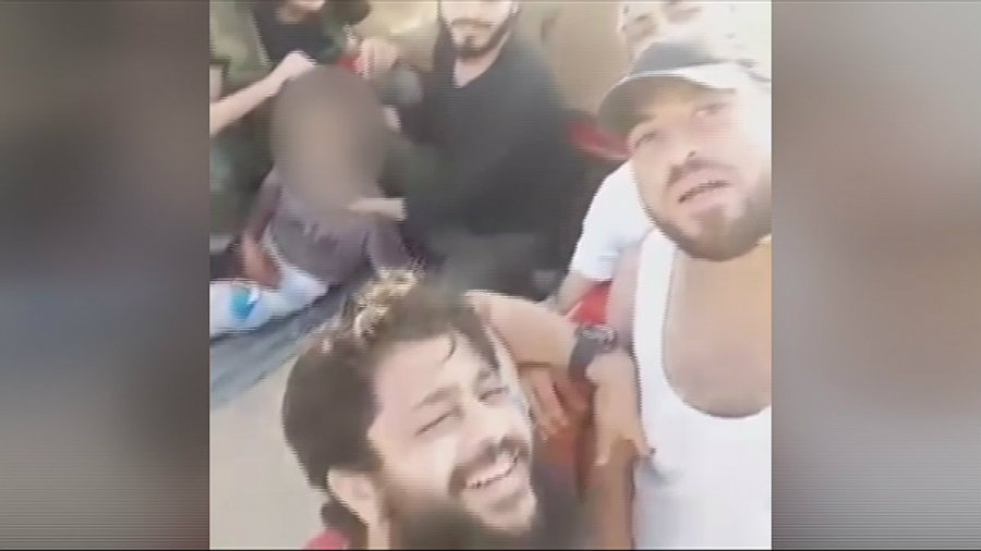 The Nour al-Din al-Zinki Movement has been accused of beheading a 12-year-old Palestinian boy who was believed to be a child soldier fighting in support of the government. The group recorded the scene in a video posted online on Tuesday. Photo credit: Scoopnest